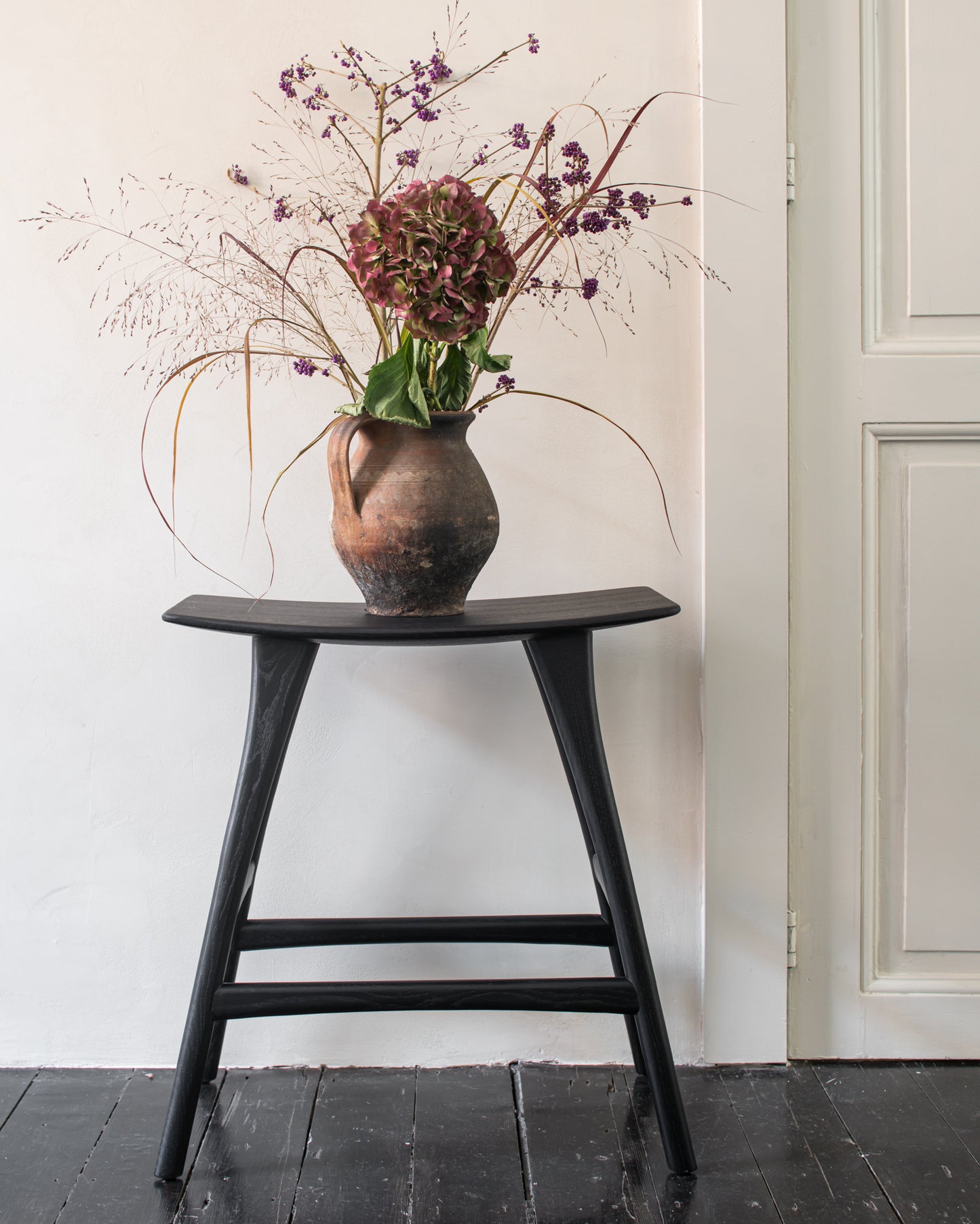 Toonzaalmodel Osso counter stool - zwart